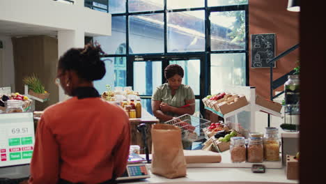 customer visiting zero waste eco store to buy natural food