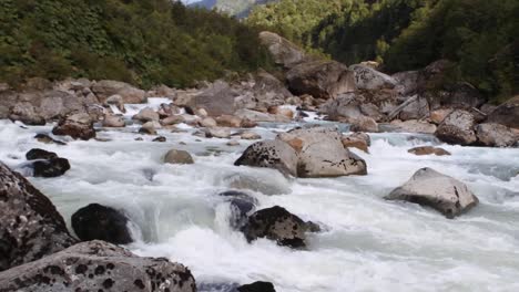 river with strong current and rocks in south of chile