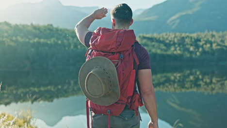 walking, view or man hiking by lake in nature to