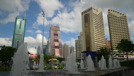 day time shenzhen city traffic street crossroad fountain slow motion panorama 4k china