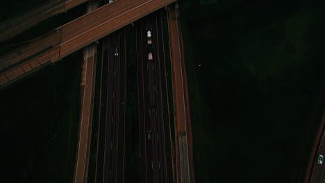 semi trucks driving at night on interstate highway i-94 in wisconsin