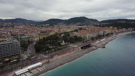 Beautiful-Beach-Coastline-of-Nice,-France---Establishing-Aerial-Drone-View