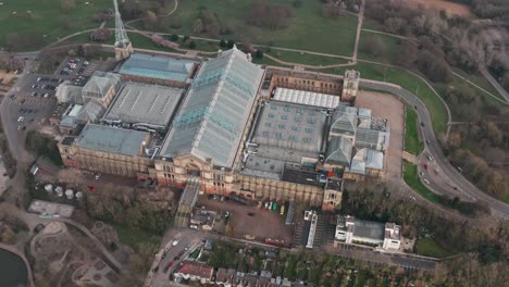 Dolly-back-pan-up-aerial-shot-of-alexandra-palace