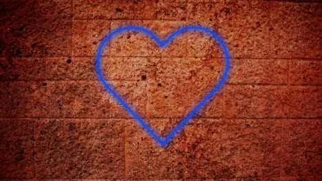 animación de un icono de corazón de neón parpadeante en una pared de ladrillo