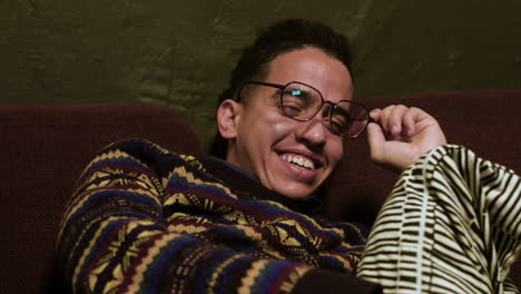 young man relaxing on the sofa