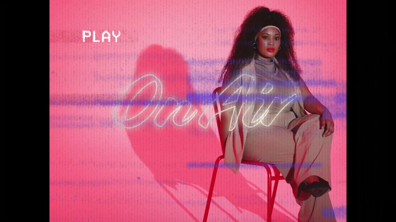 On Air graphic fading in, host sitting red chair holding gaze, blue scanline flickering for promo