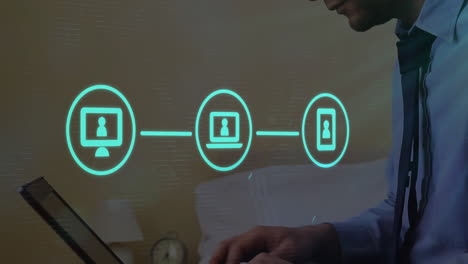 animation of network of connections with icons over biracial businessman using laptop in office