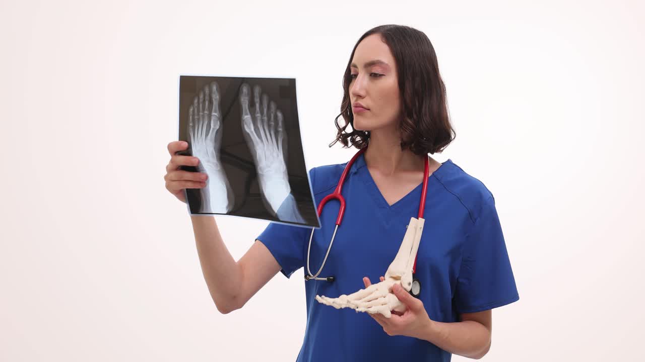 Doctor examining foot x-ray
