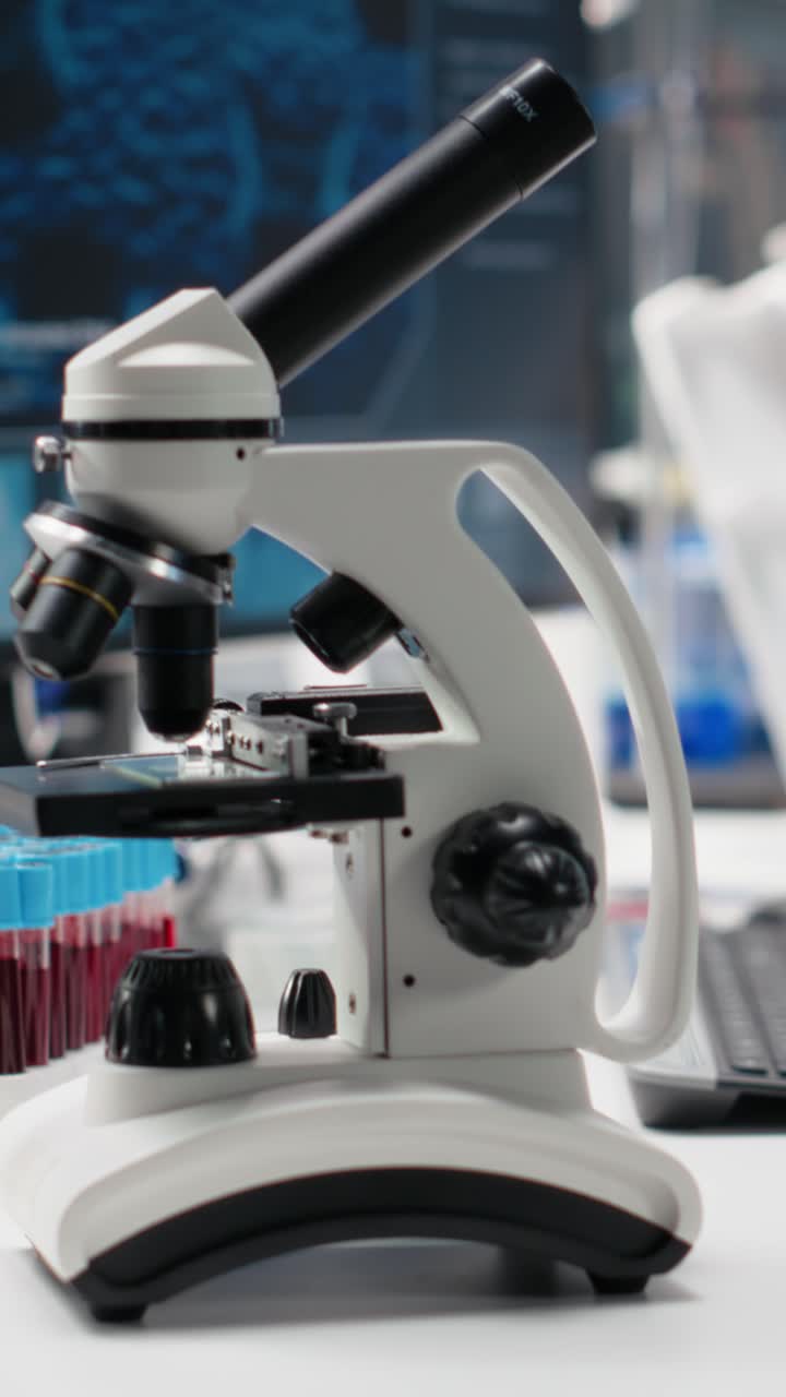 Vertical video Clinical microscope used for sample examination in hospital diagnostic lab