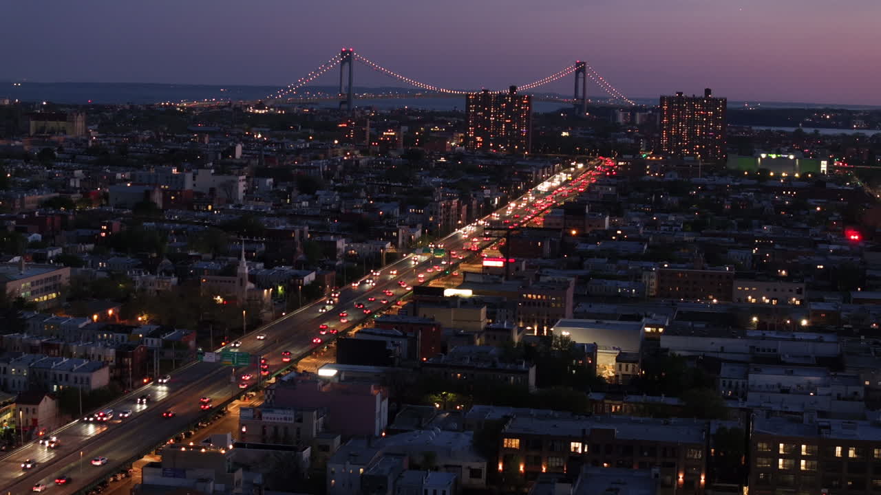 Shot in Bay Ridge, Brooklyn at night with rush hour traffic on the Belt Parkway