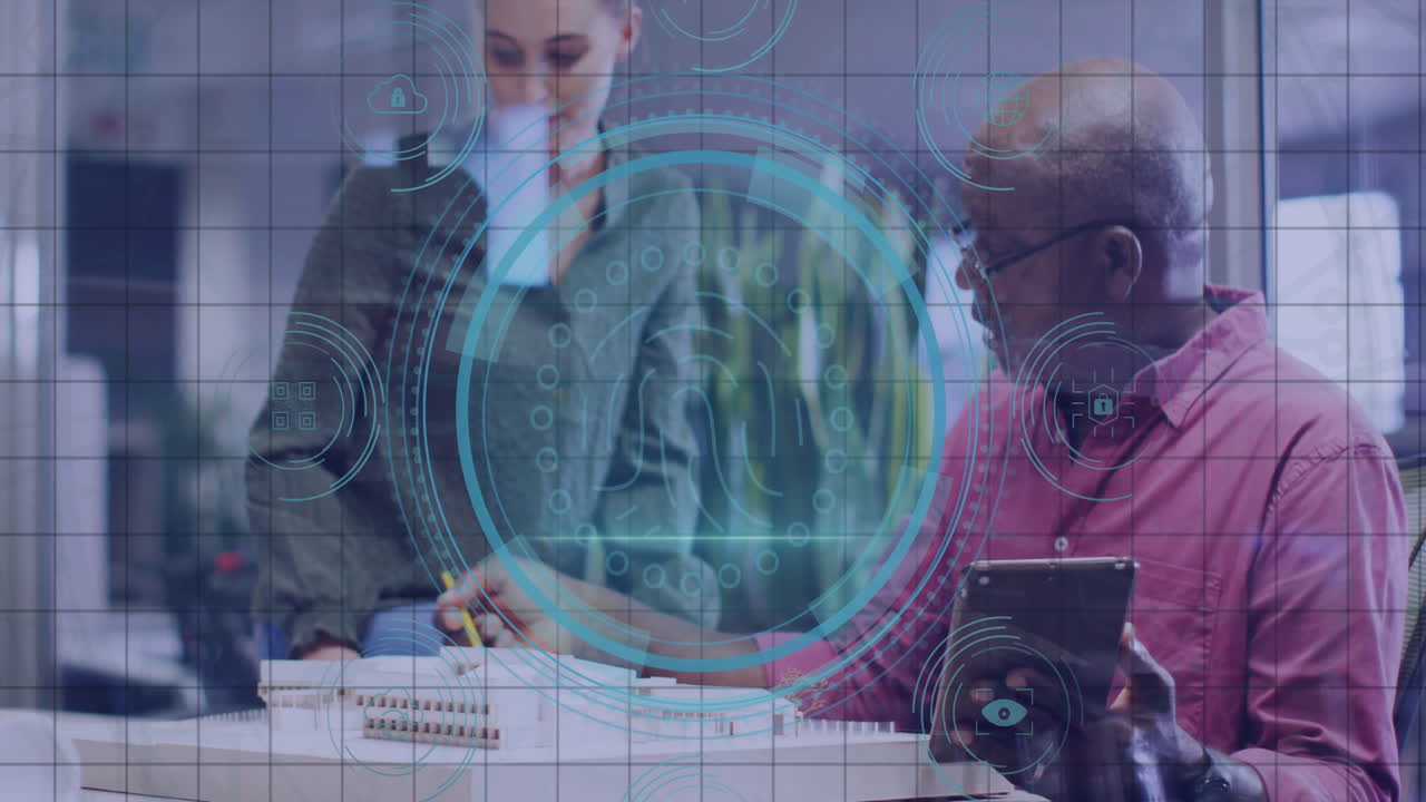 Digital interface animation over diverse colleagues collaborating in modern office