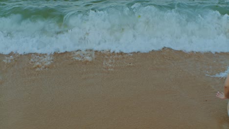 water waves on the beach of seashore sea ocean tide and sand