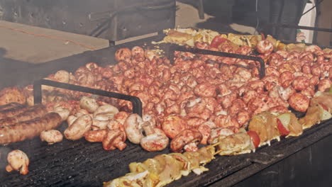assorted vegetarian meat alternative vegetables on cookout grill