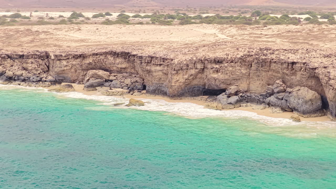 Nice aerial view of Varandinha shore,place of relaxation and adventure,beach is divided by rocks that outline its contour,creating a landscape of incredible beauty,Boa Vista,Cape Verde