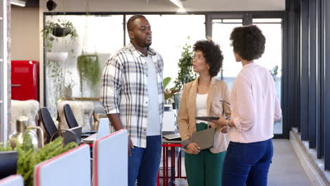 a diverse group of business colleagues brainstorming ideas in a modern office