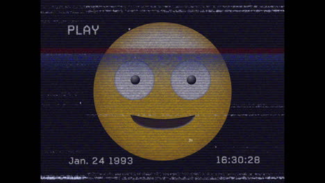 animación digital del efecto de falla de vhs sobre un emoji de cara tonta contra un fondo negro