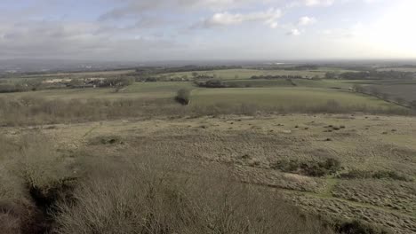 idyllic british farming meadows countryside fields aerial view over panoramic landscape