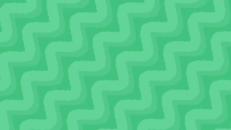 las líneas de zigzag verdes redondeadas se mueven diagonalmente.
