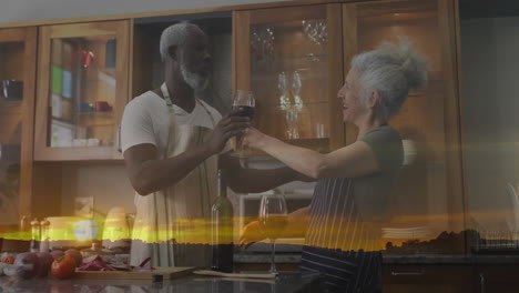 sharing wine in kitchen, couple enjoying animation of sunset landscape overlay