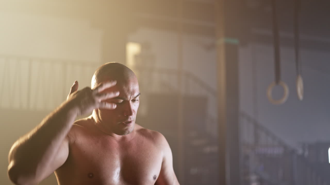 Shirtless man in gym