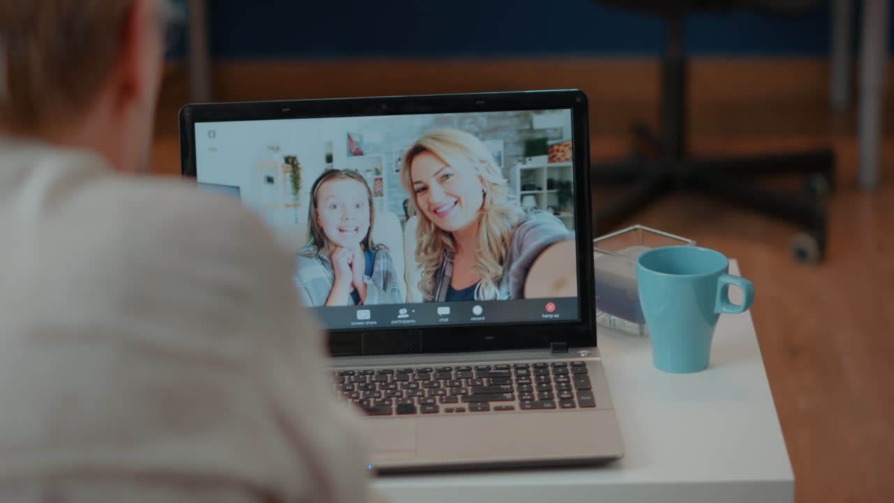 Family video call on laptop
