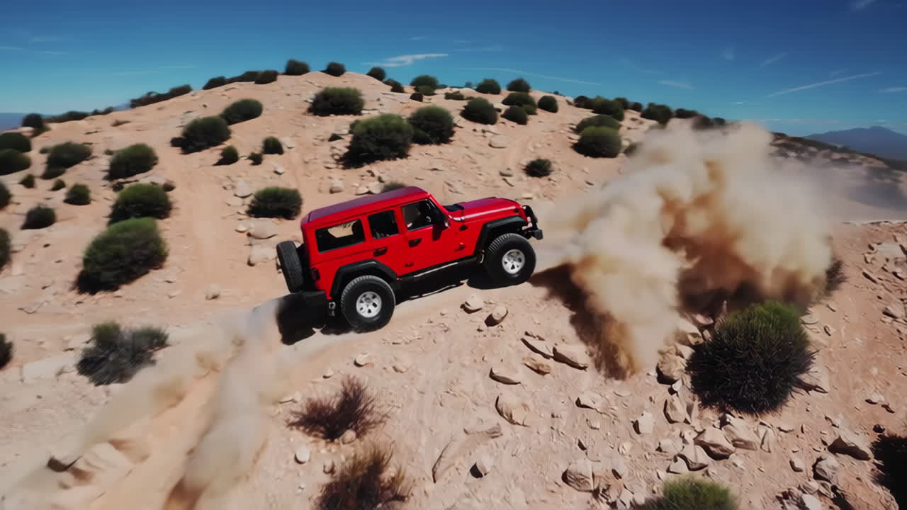 Red Jeep Wrangler Off-Roading in the Desert