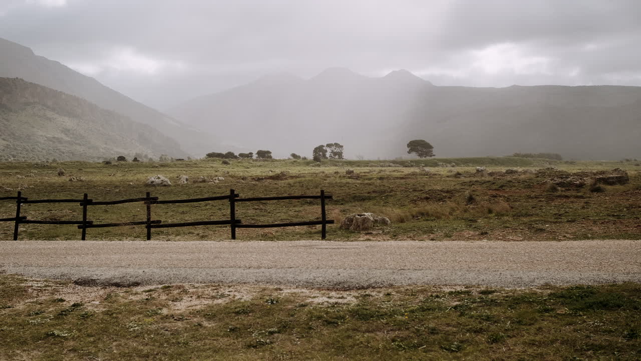 Misty Mountain Landscape with Fence