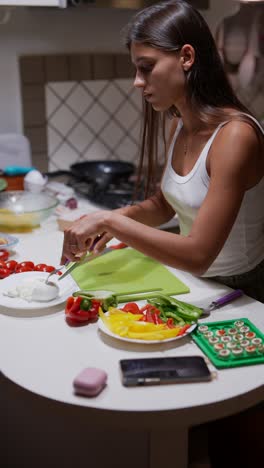 woman preparing a meal in the kitchen