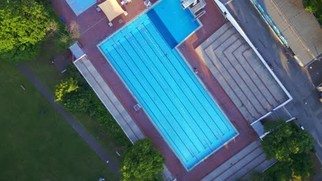 breathtaking aerial top view rotation flight berlin city public swimming pool germany in europe, summer day 2023