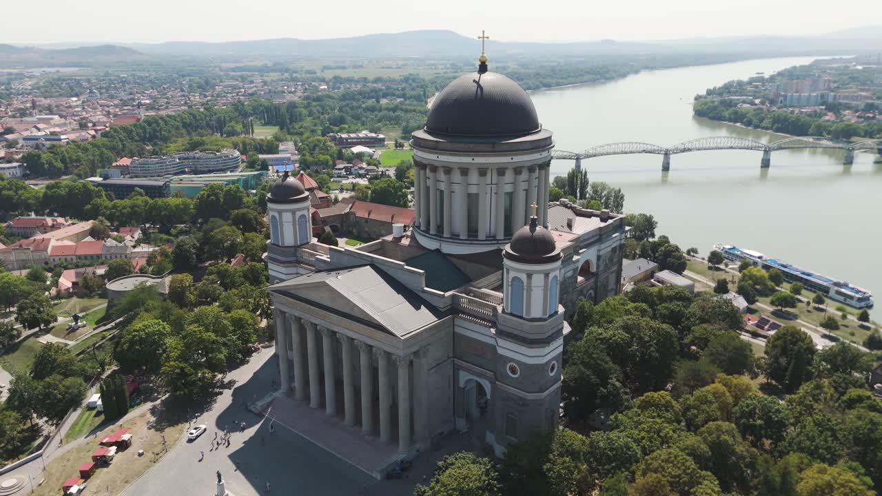 Drone of Esztergom Basilica Hungary showing dome towers, Danube river and surrounding city