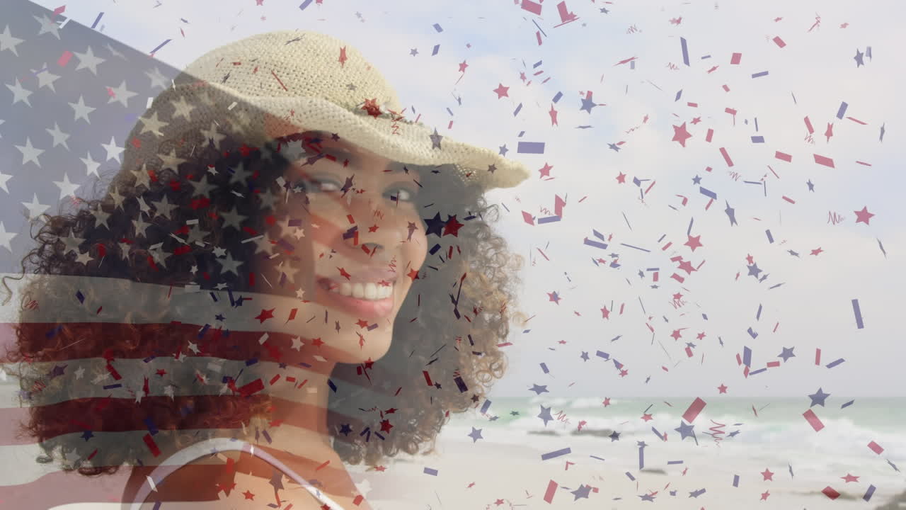 animación de la bandera de los estados unidos de américa sobre una feliz mujer afroamericana en la playa