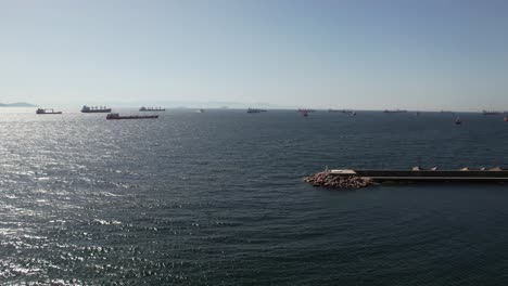 Cargo-Ships-in-Bosphorus-Strait-and-Marmara-Sea-by-Coast-of-Istanbul,-Turkey,-Drone-Shot