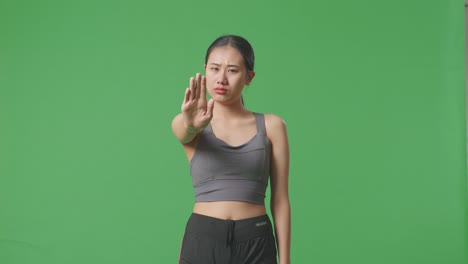 woman making stop gesture