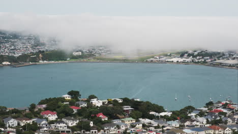 Airplane-on-final-approach-to-foggy-runway-at-Wellington-International-Airport