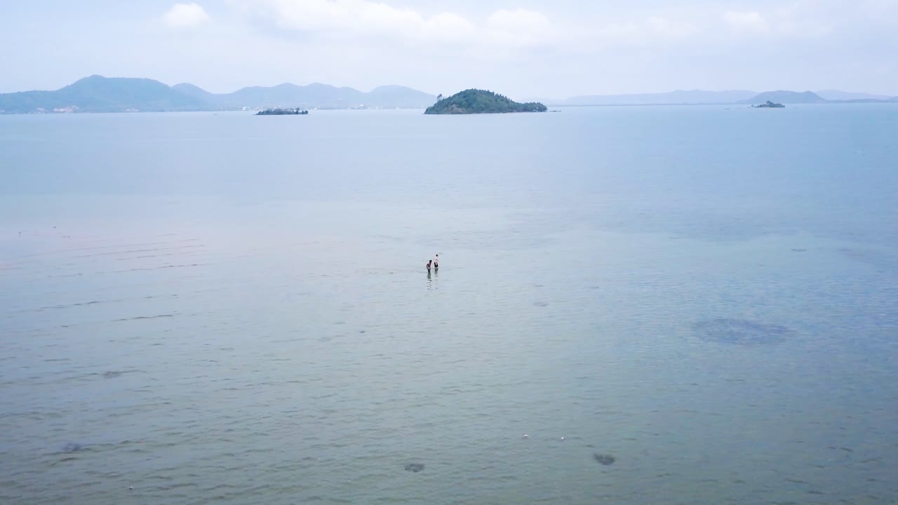 Seascape with people