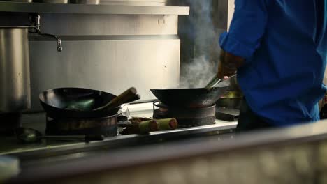 in a hot kitchen, a chef cooks up a dish