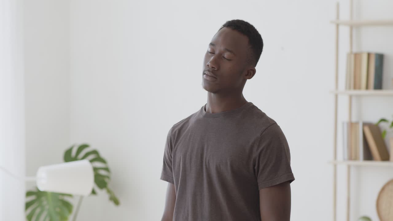 Man Meditating at Home