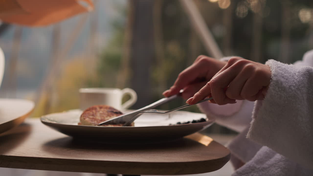 Woman Eating Breakfast