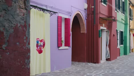 curtain in the wind at the entrance to the house