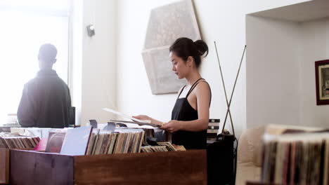 Asian-woman-in-a-music-store