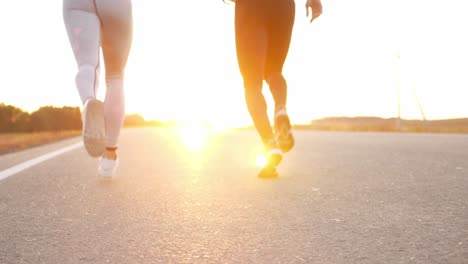 couple running at sunrise/sunset