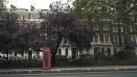 london street scene with red phone booth