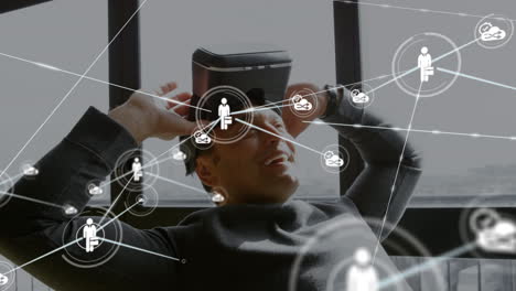 Connectors moving and digital data on man using VR helmet