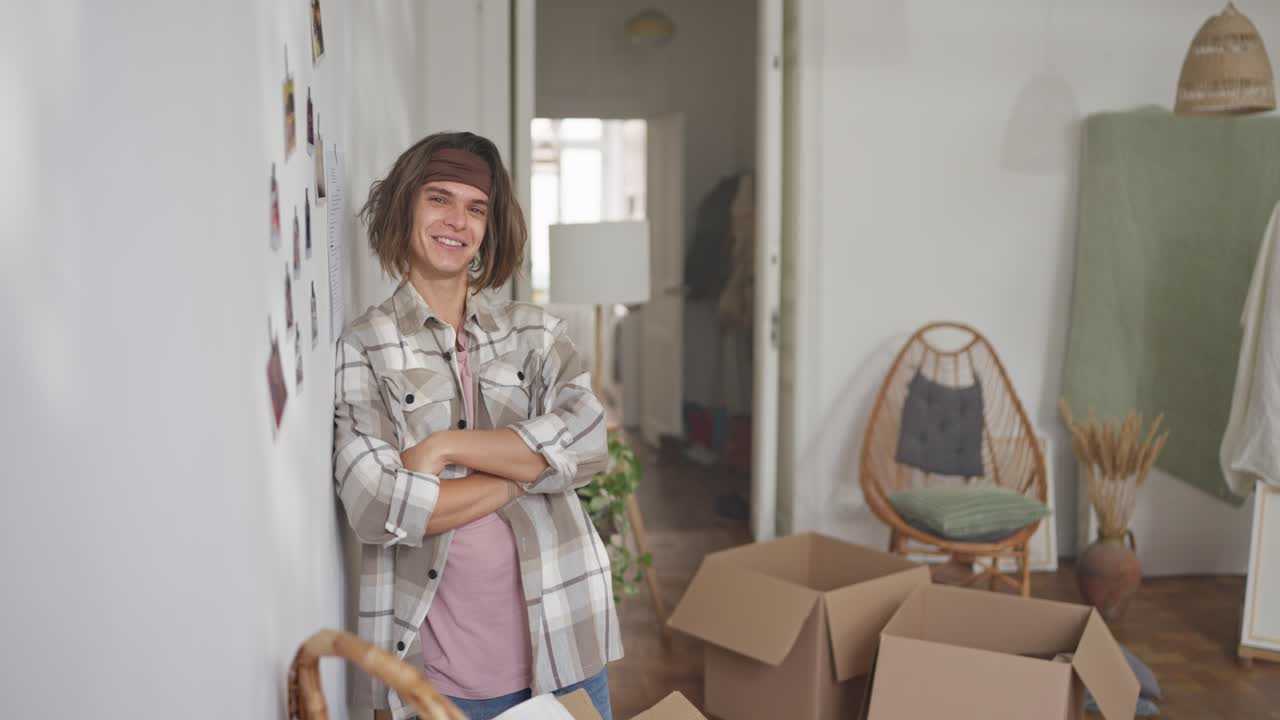 Young Man Moving Into A New Home