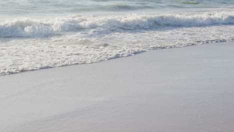 video of calm sea waves and sand beach