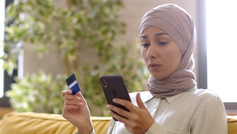 woman checking online payment