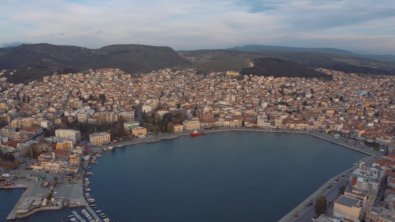Breathtaking Scenery Of A Different Houses Surrounded By Blue Calm Sea in Greece - Aerial Shot