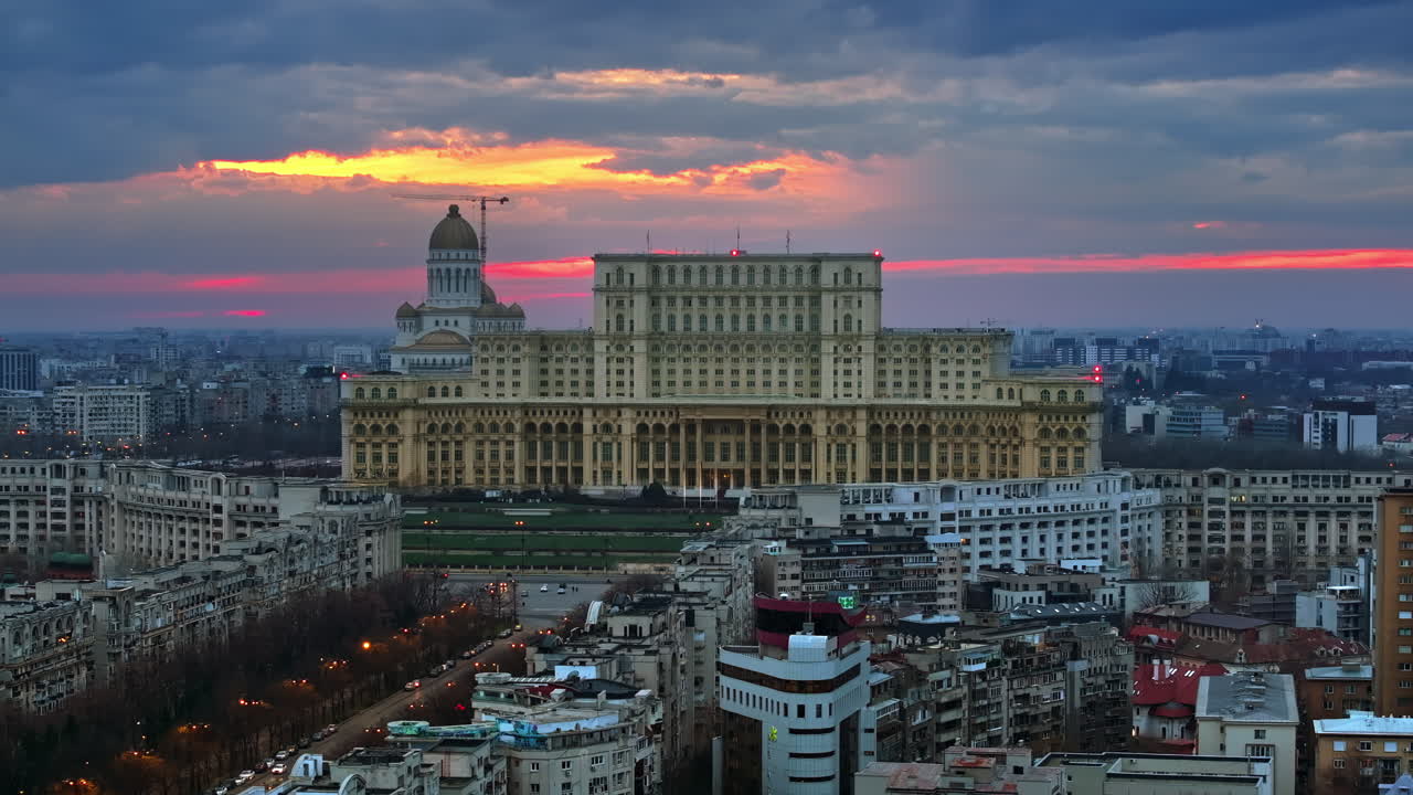 Aerial drone view of Palace of the Parliament in Bucharest downtown at sunset. Romania