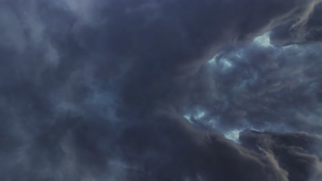 4k thunderstorm inside dark cumulonimbus clouds moving before rain