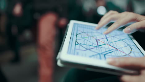 Woman-using-tablet-in-underground